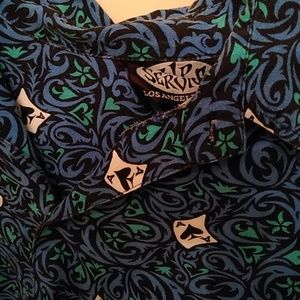 Lip service blue and white shirt.